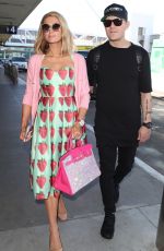 PARIS HILTON and Chris Zylka at LAX Airport in Los Angeles 02/08/2018