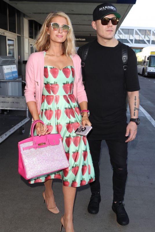 PARIS HILTON and Chris Zylka at LAX Airport in Los Angeles 02/08/2018
