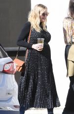 Pregnant KIRSTEN DUNST at McConnell