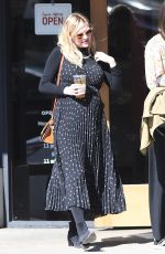 Pregnant KIRSTEN DUNST at McConnell
