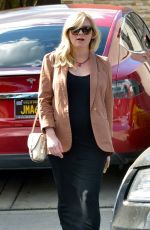 Pregnant KIRSTEN DUNST Picks Up Her Car from a Valet in West Hollywood 02/13/2018