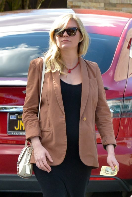 Pregnant KIRSTEN DUNST Picks Up Her Car from a Valet in West Hollywood 02/13/2018