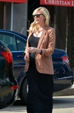 Pregnant KIRSTEN DUNST Picks Up Her Car from a Valet in West Hollywood 02/13/2018