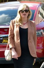 Pregnant KIRSTEN DUNST Picks Up Her Car from a Valet in West Hollywood 02/13/2018