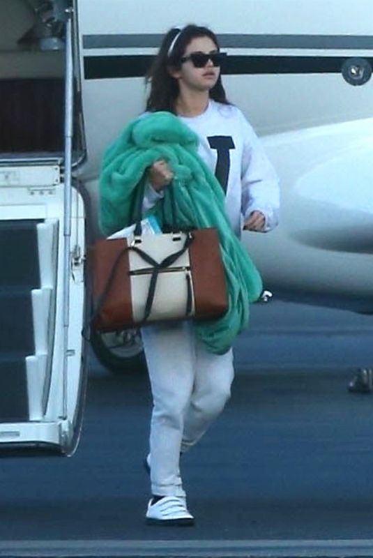 SELENA GOMEZ Arrives at a Private Jet in Los Angeles 02/07/2018