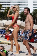 SOFIJA MILOSEVIC in Bikini and Adem Ljajic on the Beach in Miami 02/14/2018