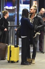 ZOE SALDANA and Marco Perego at LAX Airport in Los Angeles 02/01/2018