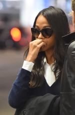 ZOE SALDANA and Marco Perego at LAX Airport in Los Angeles 02/01/2018