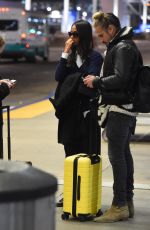 ZOE SALDANA and Marco Perego at LAX Airport in Los Angeles 02/01/2018