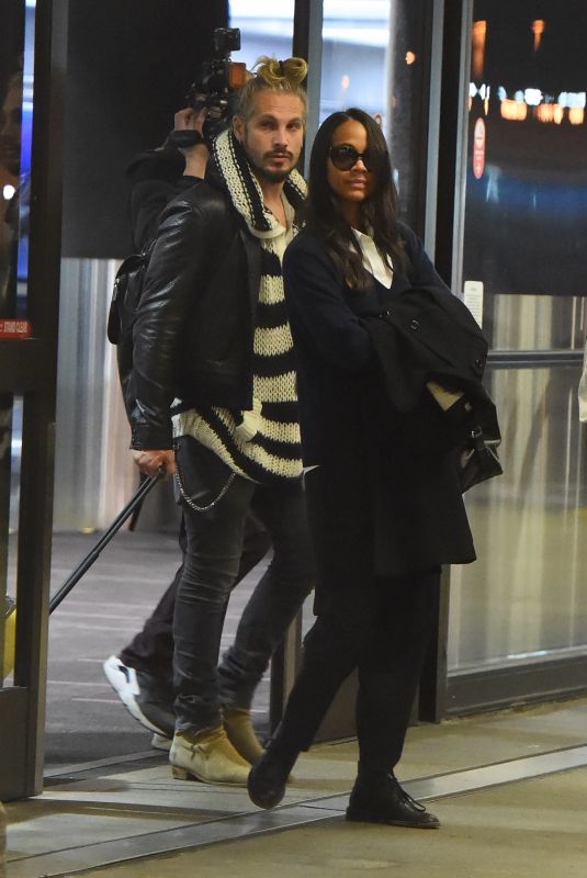 ZOE SALDANA and Marco Perego at LAX Airport in Los Angeles 02/01/2018