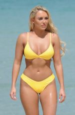 AMBER TURNER in Yellow Bikini at a Beach in Dubai 03/09/2018