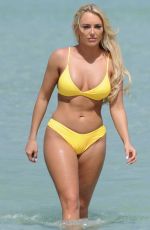 AMBER TURNER in Yellow Bikini at a Beach in Dubai 03/09/2018