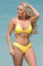 AMBER TURNER in Yellow Bikini at a Beach in Dubai 03/09/2018