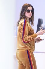 ANNE HATHAWAY at JFK Airport in New York 03/09/2018