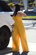 ARIEL WINTER in Yellow Jumpsuit at a Studio in Los Angeles 03/29/2018