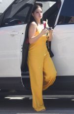 ARIEL WINTER in Yellow Jumpsuit at a Studio in Los Angeles 03/29/2018