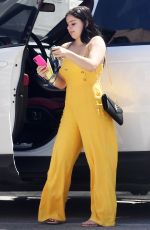 ARIEL WINTER in Yellow Jumpsuit at a Studio in Los Angeles 03/29/2018