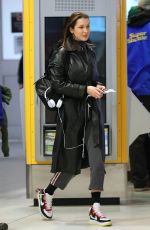 BELLA HADID Arrives at JFK Airport in New York 03/10/2018