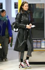 BELLA HADID Arrives at JFK Airport in New York 03/10/2018