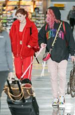 BELLA THORNE and Mod Sun at JFK Airport in New York 03/20/2018