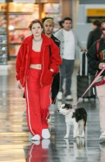 BELLA THORNE and Mod Sun at JFK Airport in New York 03/20/2018