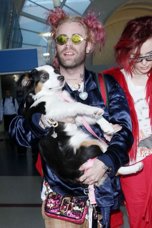 BELLA THORNE and Mod Sun at JFK Airport in New York 03/23/2018