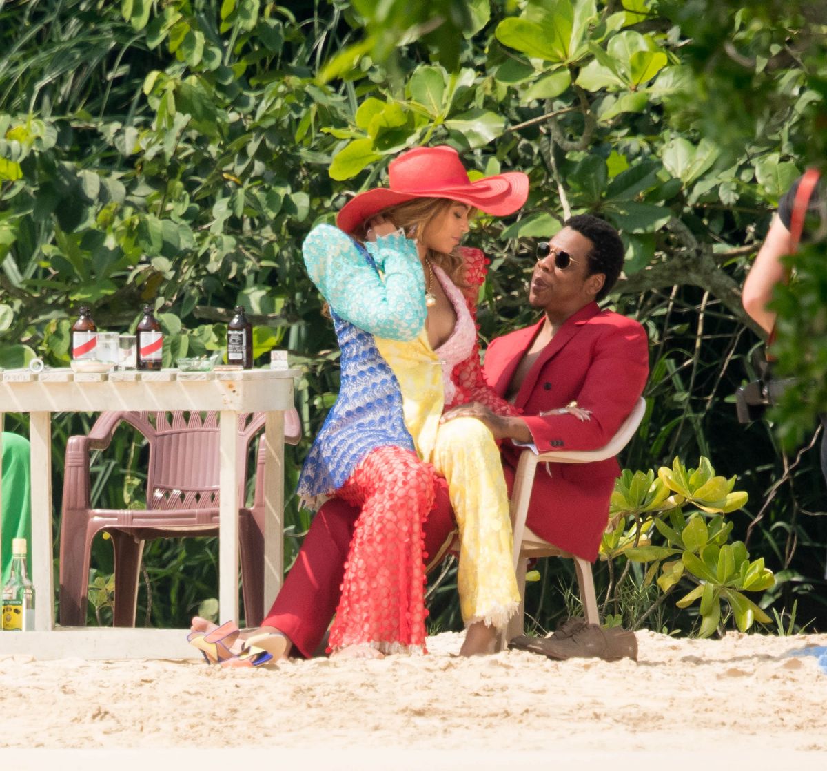 BEYONCE and Jay-Z on the Set of a Video at a Beach in 