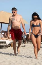 BRE TIESI in Bikini and Johnny Manziel at a Beach in Miami 03/01/2018