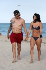 BRE TIESI in Bikini and Johnny Manziel at a Beach in Miami 03/01/2018