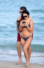 BRE TIESI in Bikini and Johnny Manziel at a Beach in Miami 03/01/2018