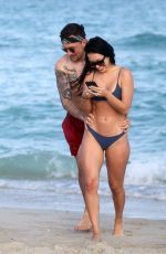 BRE TIESI in Bikini and Johnny Manziel at a Beach in Miami 03/01/2018
