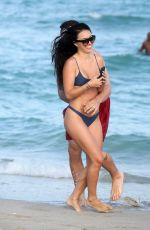 BRE TIESI in Bikini and Johnny Manziel at a Beach in Miami 03/01/2018