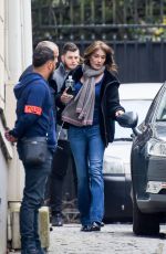 CARLA BRUNI-SARKOZY Leaves Her Home in Paris 03/23/2018