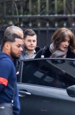 CARLA BRUNI-SARKOZY Leaves Her Home in Paris 03/23/2018