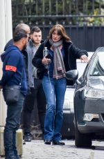 CARLA BRUNI-SARKOZY Leaves Her Home in Paris 03/23/2018
