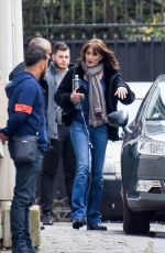 CARLA BRUNI-SARKOZY Leaves Her Home in Paris 03/23/2018