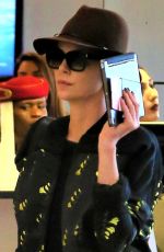 CHARLIZE THERON at Los Angeles International Airport 03/15/2018