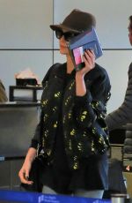 CHARLIZE THERON at Los Angeles International Airport 03/15/2018