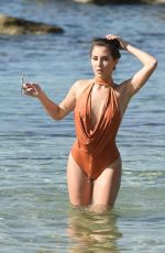 CHLOE GOODMAN in Swimsuit on the Beach in Dubai 03/28/2018