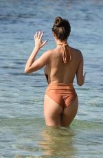 CHLOE GOODMAN in Swimsuit on the Beach in Dubai 03/28/2018