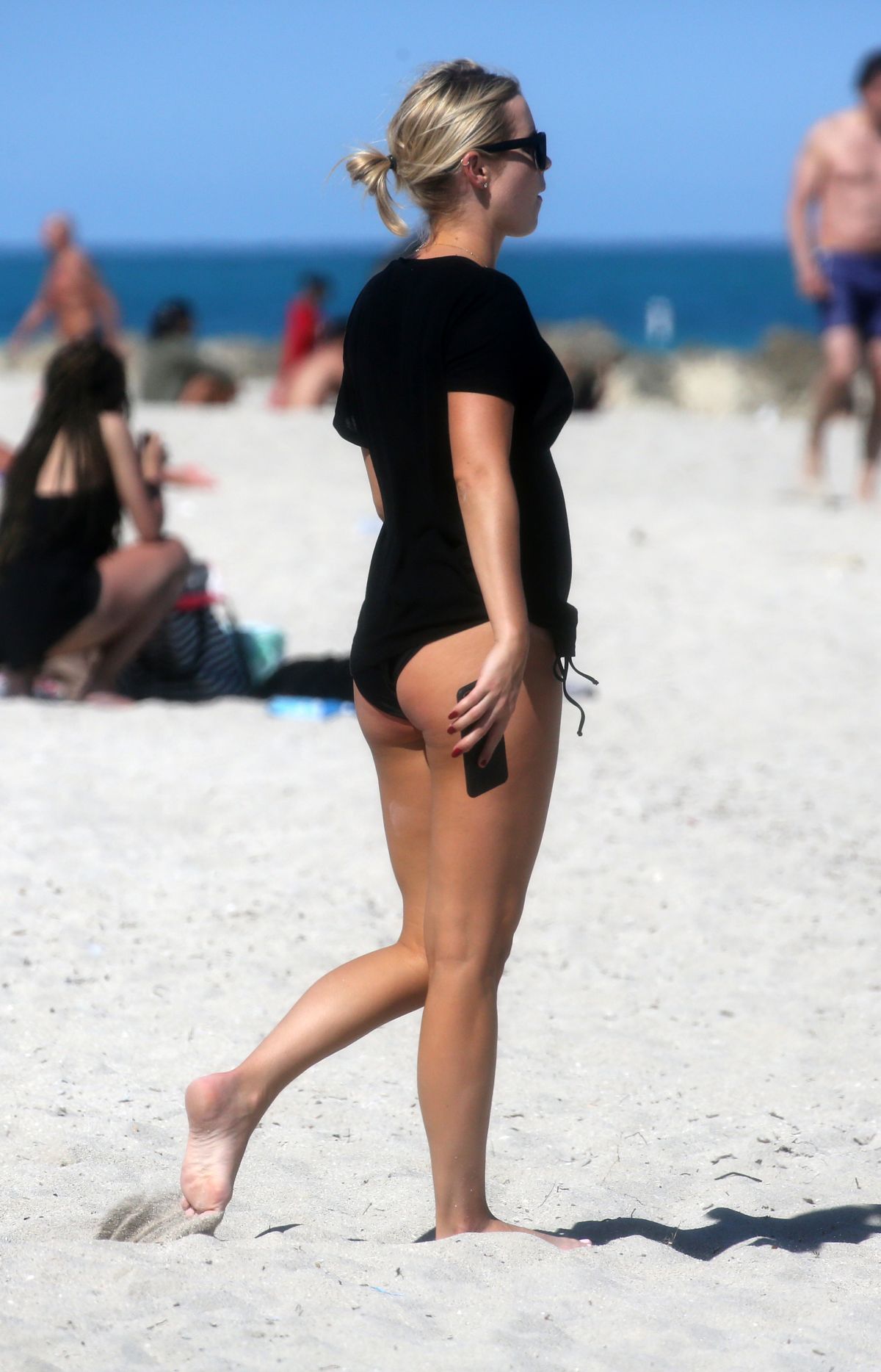 CLAIRE HOLT in Bikini Bottom at a Beach in Miami 03/16/2018.