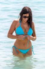 CLAUDIA ROMANI in Bikini at a Beach in Miami 03/22/2018
