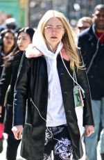 DAKOTA FANNING Heading to Soulcycle in New York 03/26/2018