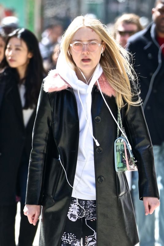 DAKOTA FANNING Heading to Soulcycle in New York 03/26/2018
