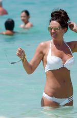 DANIELLE LLOYD in White Bikin on the Beach in Dubai 03/29/2018