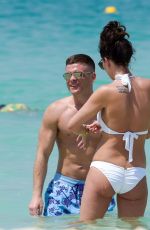 DANIELLE LLOYD in White Bikin on the Beach in Dubai 03/29/2018