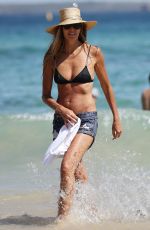 ELLE MACPHERSON in Bikini Top at Bondi Beach in Sydney 03/18/2018