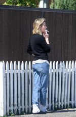 EMMA ROBERTS on a Smoke Break in Los Angeles 03/14/2018