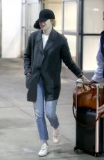 EMMA STONE at Heathrow Airport in London 03/26/2018