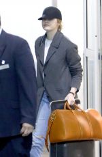 EMMA STONE at Heathrow Airport in London 03/26/2018